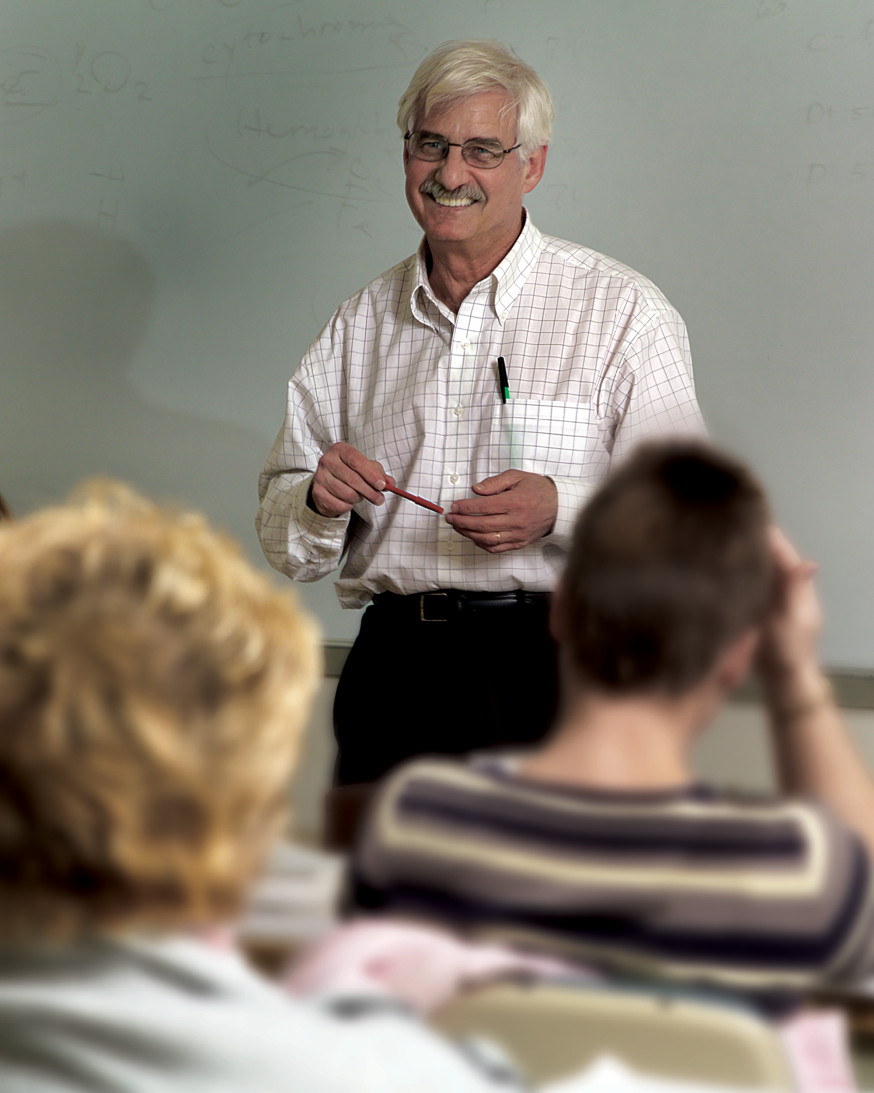 Dr. Michael Hochberg teaching in a classroom