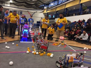 "Geared Up FTC 6347" at the January 17 FTC RES-Q Challange with their robot named "Rossi" in the foreground. The robot is named for their mentor and friend, Elizabeth Rossi, FIRST Partner and K-12 Outreach Director at SUNY Poly! 