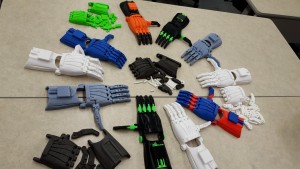 Prosthetic hands created by New Hartford RoboSpartans and SUNY Poly engineering students help those in need.
