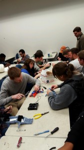 Students work to create prosthetic hands for people in third-world countries.