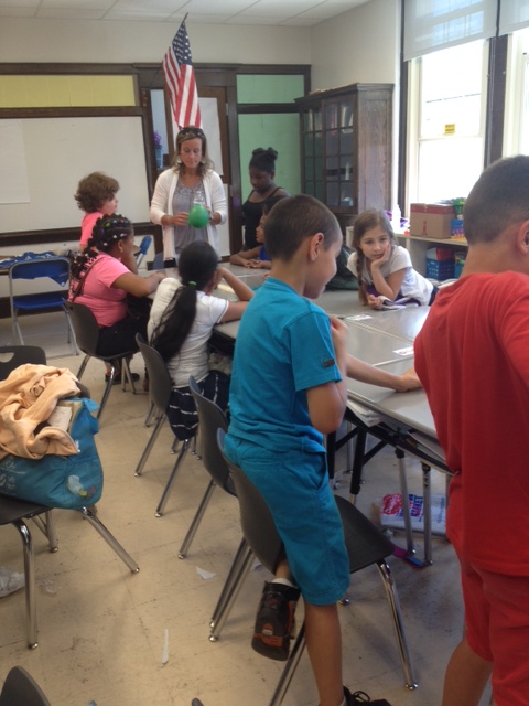 Jacqueline Keida works with kids at Hughes Elementary School in Utica in STEM / NANO instruction.