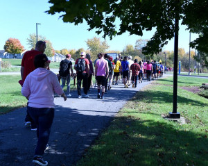 Students, faculty, and staff walk the Utica Campus of SUNY Poly for Breast Cancer Awareness. (Photo: Lynne Browne)