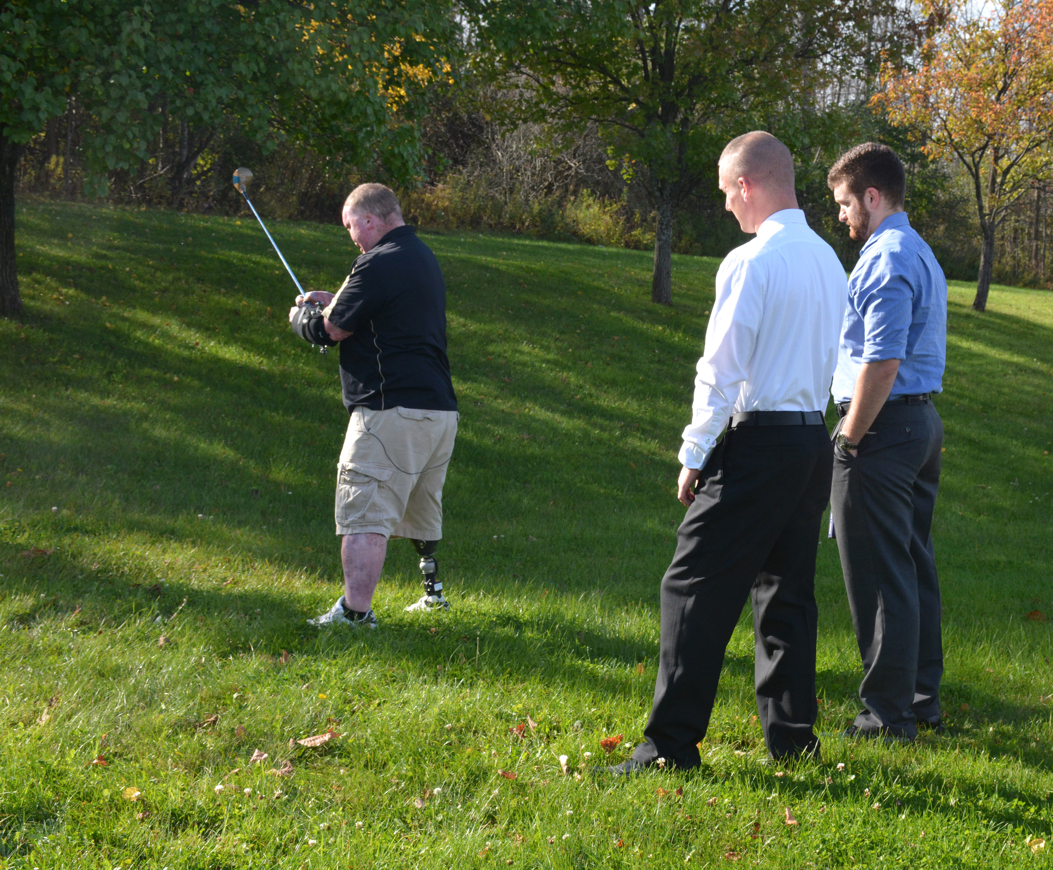 Veteran Rick Yarosh tests adaptive golf club.