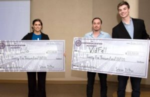 Stacey Smith, left, co-founder of Lilo, stands with Steve Messa and Joel Robinson, co-founders of VidFall, after winning the Demo Day audience and judges’ votes, respectively. The two startups each won $25,000 for their plans to transform Air Force Research Lab technologies into commercial goods or services.