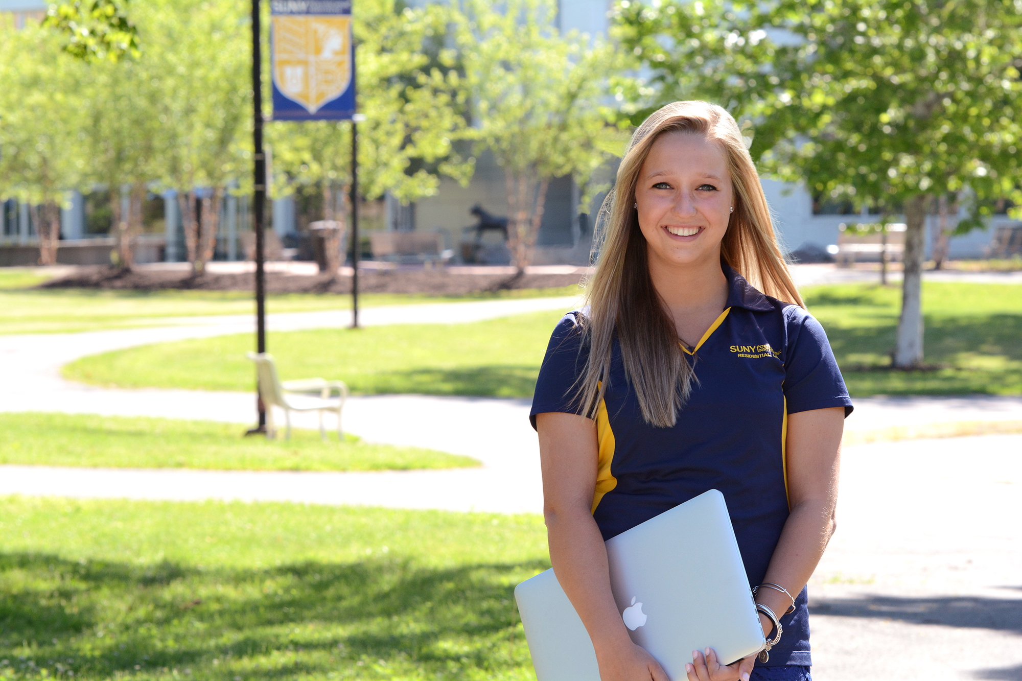 Samantha Stewart in front of the Student Center