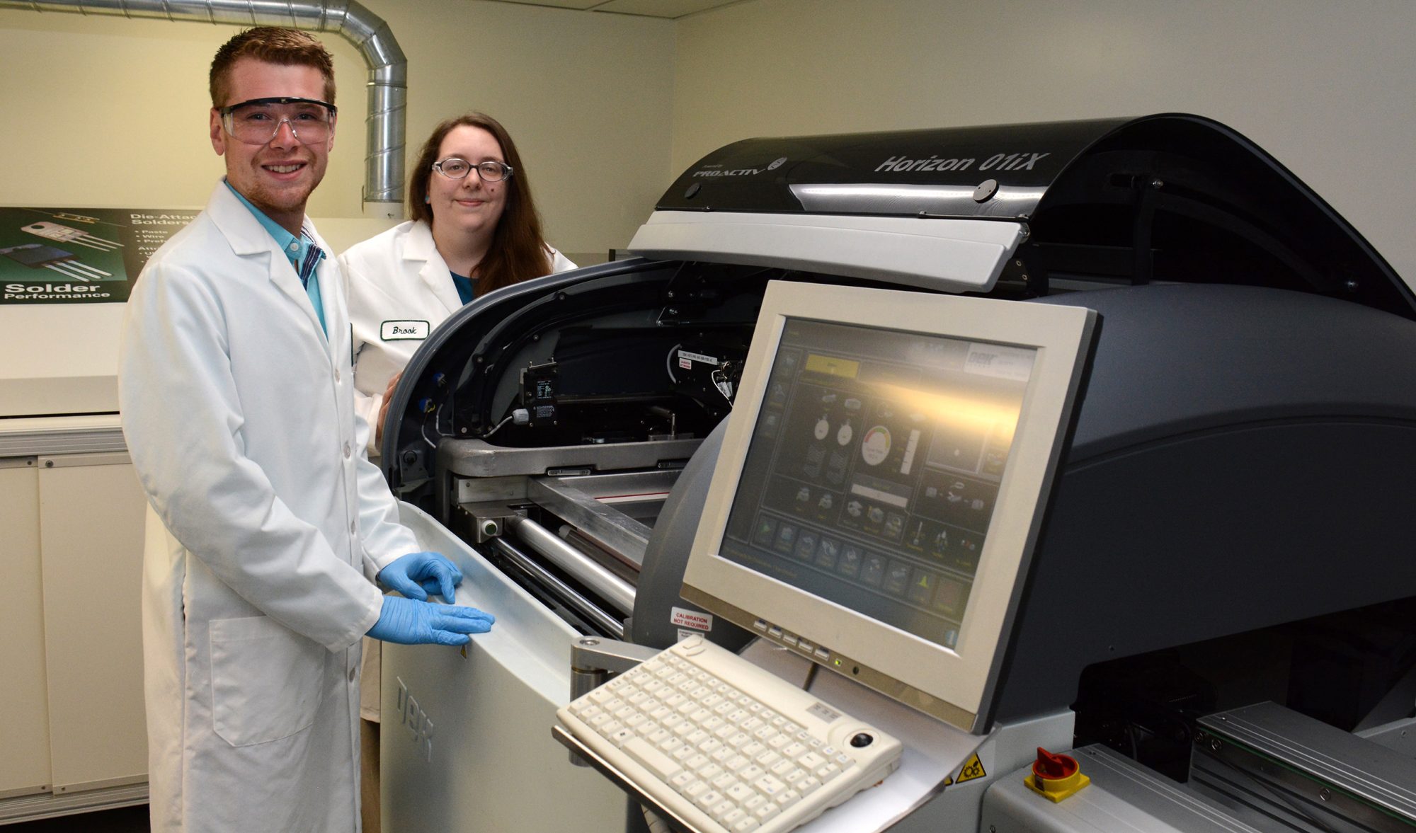 John Russo with his supervisor during his internship at Indium Corp.