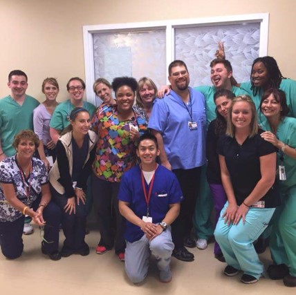 Flenory and peers in the medical profession posing for group photo