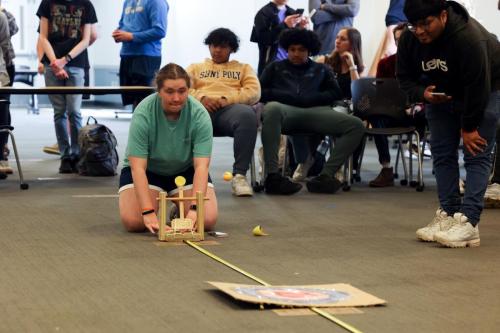 Engineering student participating in activity.